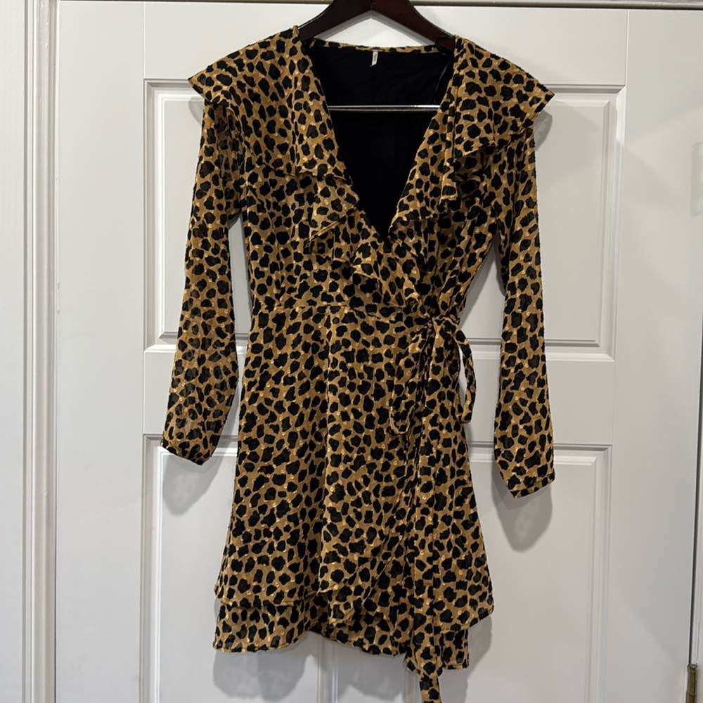 Free People cheetah print mini wrap dress. Worn once.
